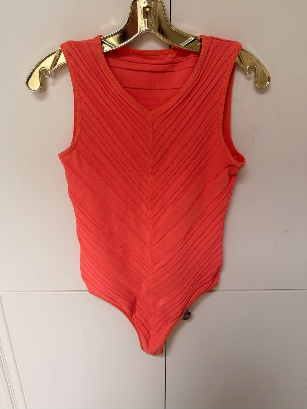 Wolford Coral Red Ribbed V‑Neck Sleeveless Bodysuit